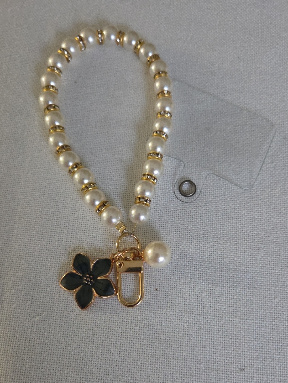 Pearl Beaded Phone Wrist Strap with Black Flower Charm